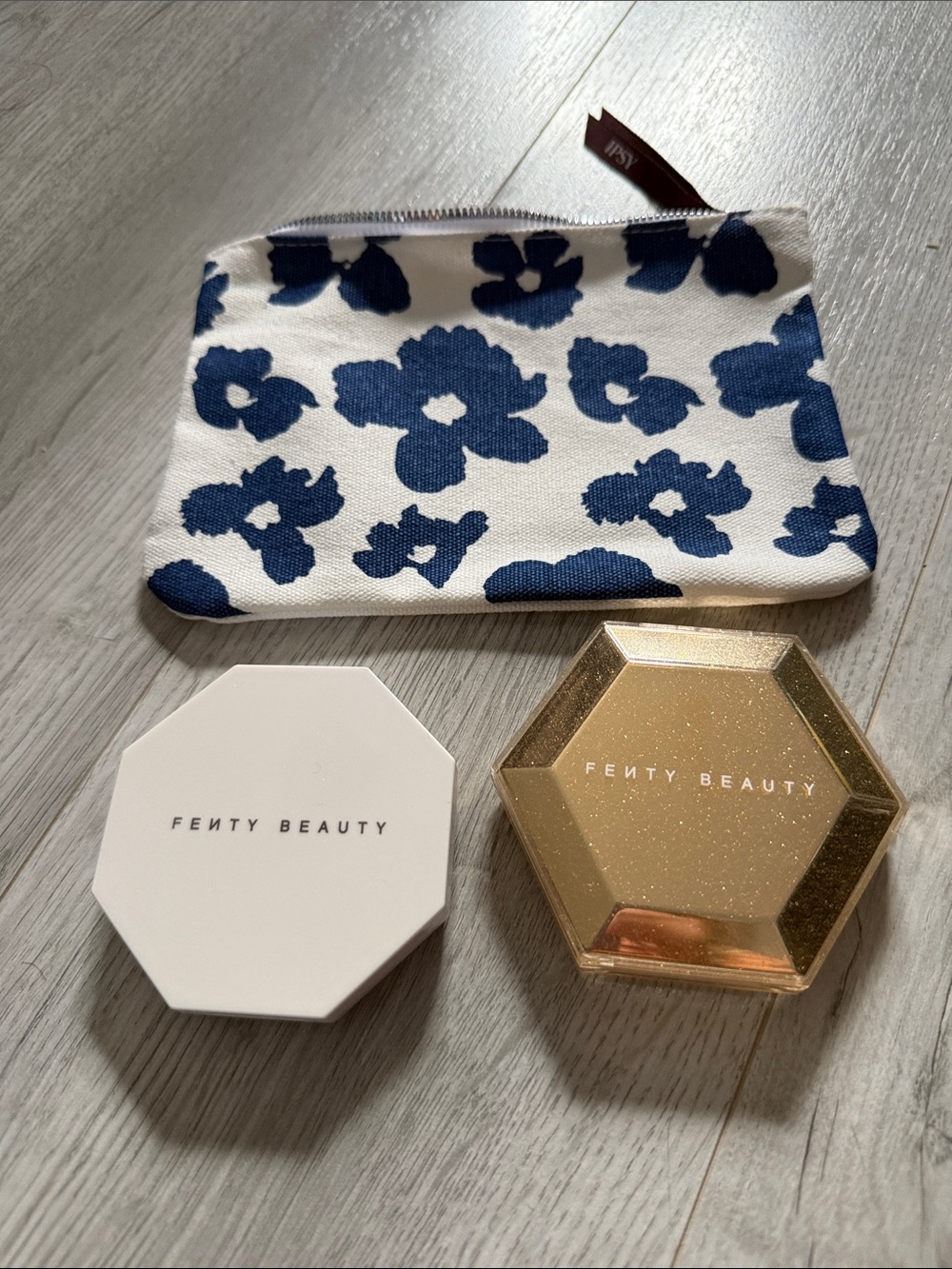 Fenty highlighters trophy wife & royal  icing with a new makeup bag